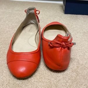 Calvin Klein round toe flats with bow detail on back